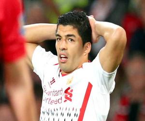 Hãy nhìn Rooney, Suarez!