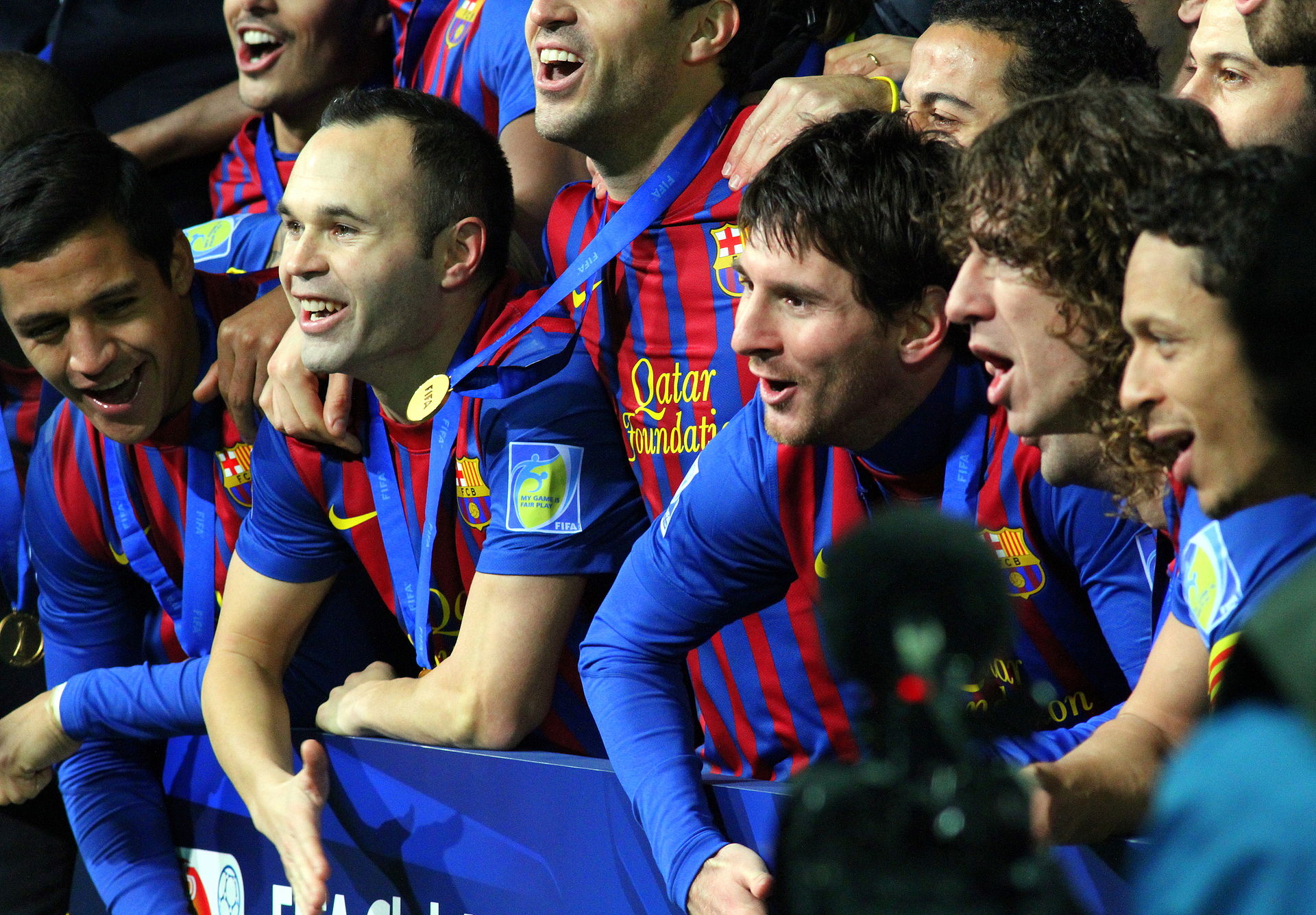 Messi and his teammates in the FIFA Club World Cup 2011 final