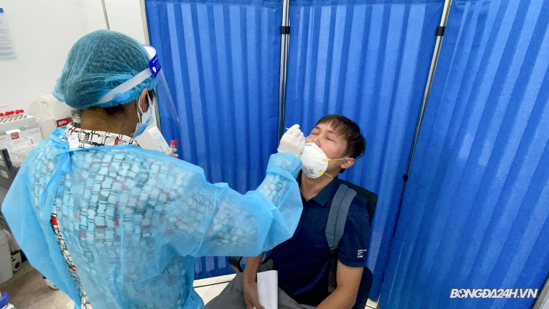 phóng viên xét nghiệm covid19