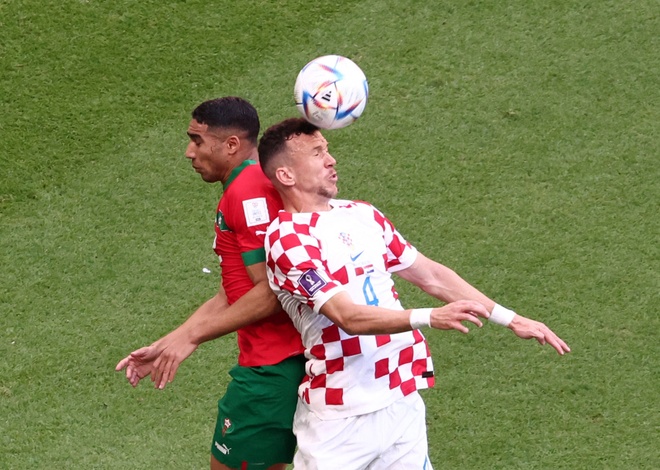 2022_11_23T103546Z_1225570725_UP1EIBN0TFK7A_RTRMADP_3_SOCCER_WORLDCUP_MAR_CRO_REPORT