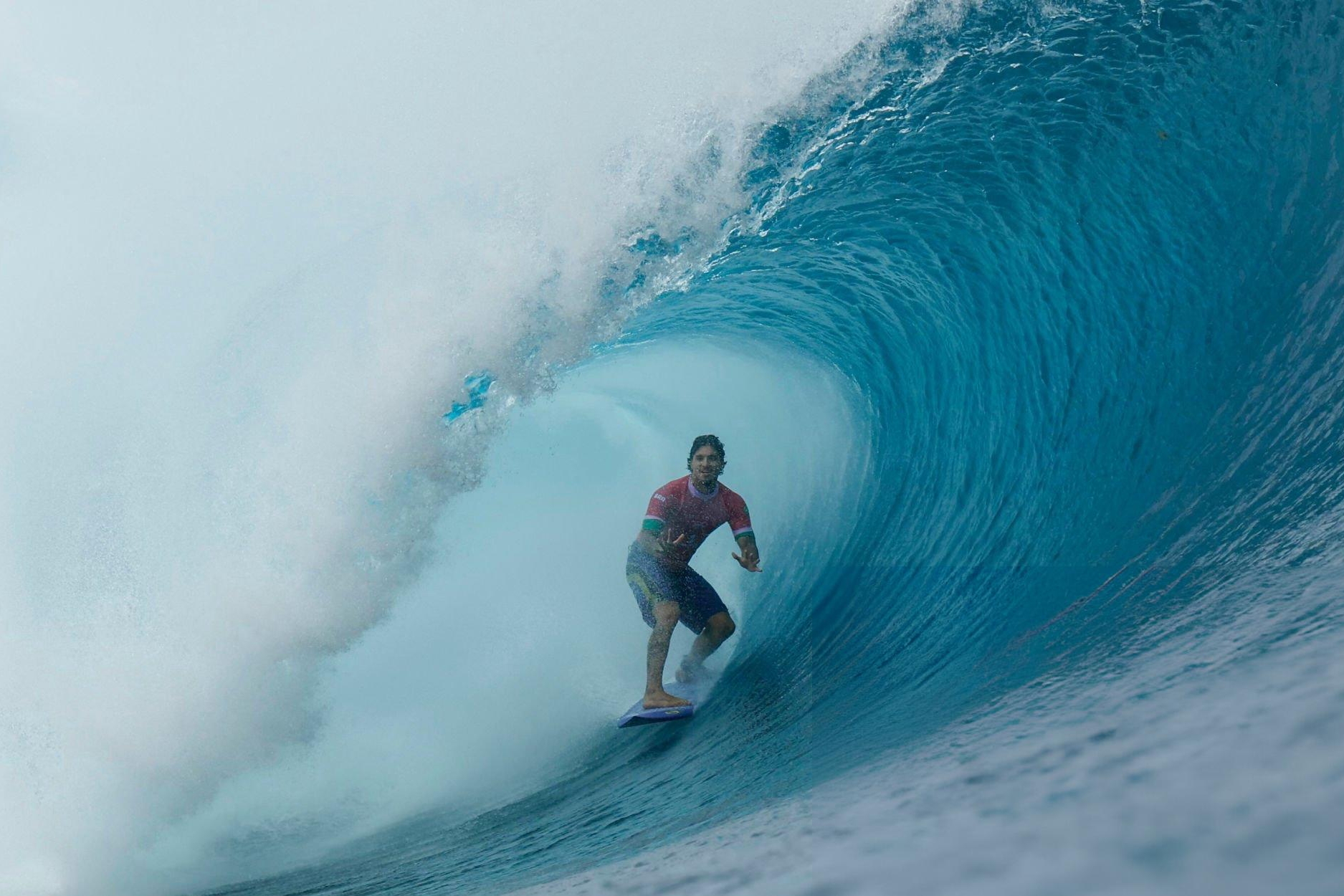 Bức ảnh khiến VĐV lướt sóng như siêu anh hùng 4 Bức ảnh khiến VĐV lướt sóng như siêu anh hùng 4