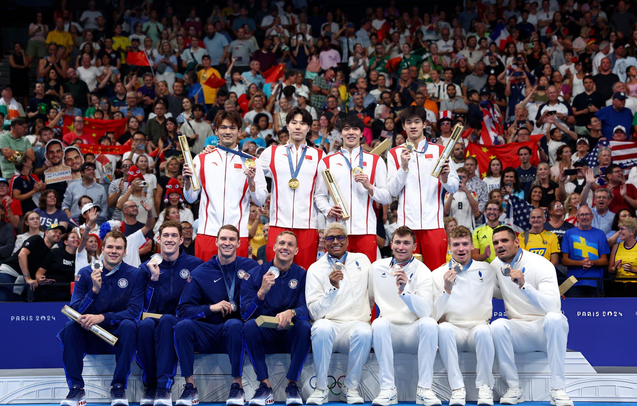 Chặn đứng kỷ lục của Mỹ sau 64 năm, VĐV Trung Quốc bị trao huy chương “có vấn đề” 1