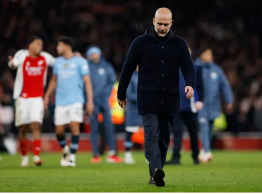 Pep Guardiola o tran thua 1-5 cua Man City truoc Arsenal mua truoc.