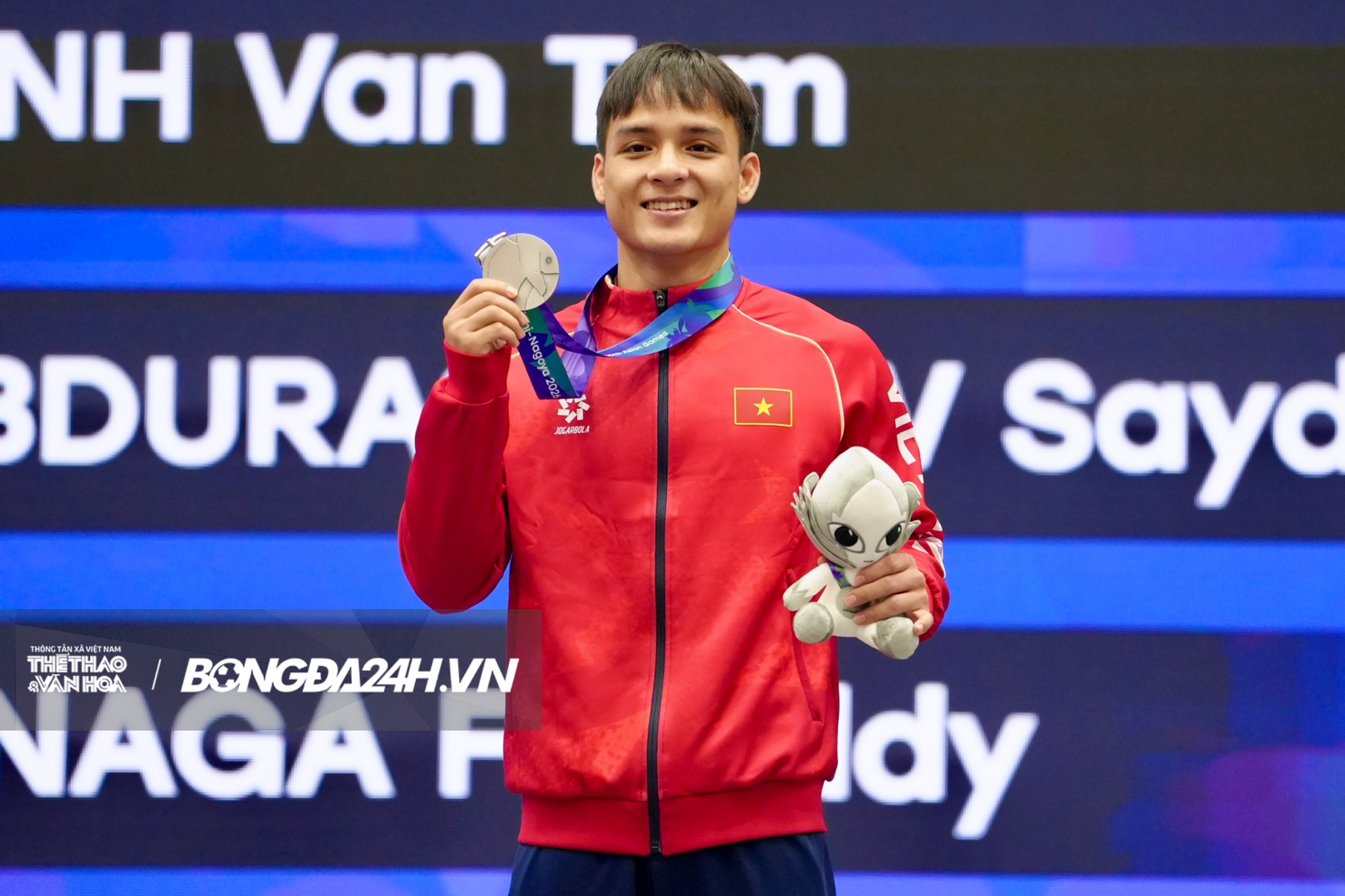 dinh Van Tam dem ve tam HCB ASIAD 20 cho wushu Viet Nam