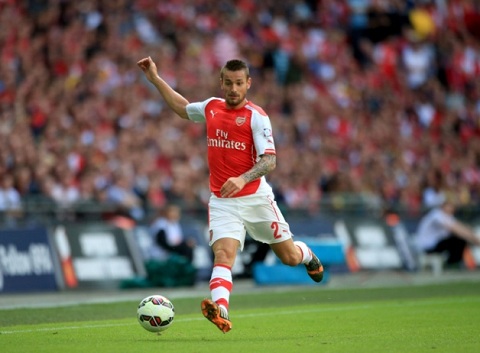 Wenger de Debuchy da trung ve hinh anh