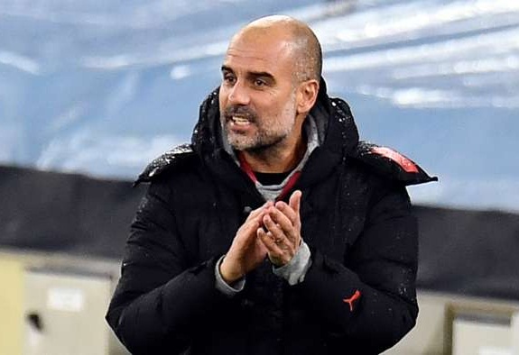 Pep Guardiola Đây là một mùa giải kỳ lạ với mọi CLB hình ảnh