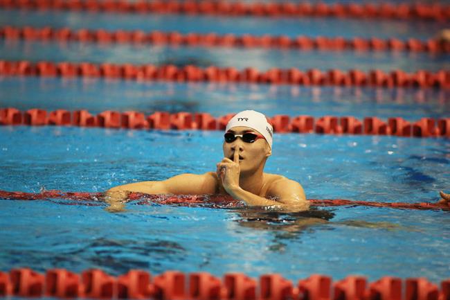 Pham Thanh Bao xuat sac ve dich o vi tri thu nhat voi thanh tich 1 phut 0 giay 97. anh: Trong Hieu