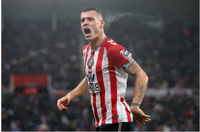 Granit Xhaka đang chơi rất tốt ở mùa giải năm nay. Granit Xhaka dang choi rat tot o mua giai nam nay.