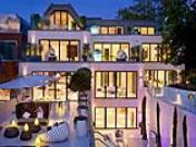 Đến London, Ozil thuê nhà ngay giữa "lòng địch"