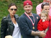 Vợ chồng Becks hớn hở thi chạy