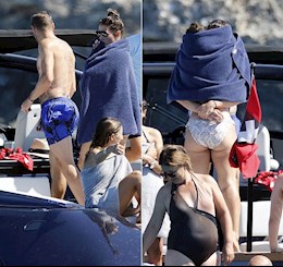 Vợ chồng Jamie Vardy trùm khăn ôm hôn thắm thiết