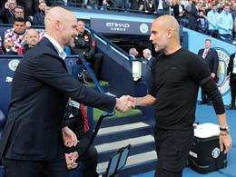 HLV Pep Guardiola chúc mừng MU